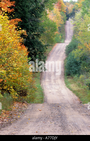HILLY ROAD THROUGH CHEQUAMEGON NATIONAL FOREST IN NORTHERN WISCONSIN. EARLY FALL. Stock Photo
