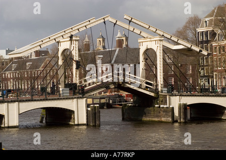 Open White Skinny Bridge or Magere Brug on Amstel River, Amsterdam Holland Stock Photo