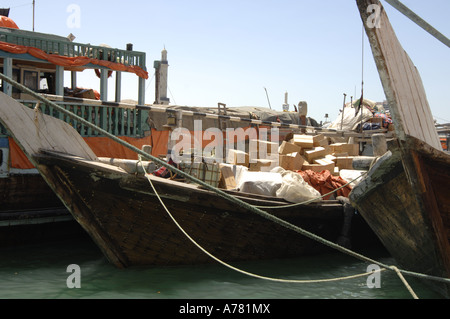 Dhow laden with goods Dubai creek Stock Photo