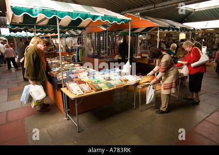 UK Cheshire Northwich Vale Royal Indoor Market Hall stall selling books Stock Photo