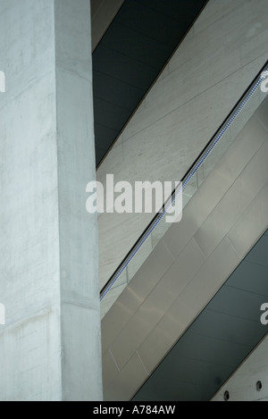 Architectural detail, concrete wall and escalator Stock Photo