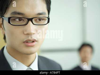 Businessman wearing glasses, close-up portrait Stock Photo