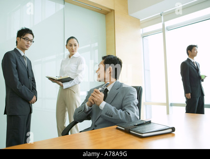 Business executives working in office Stock Photo
