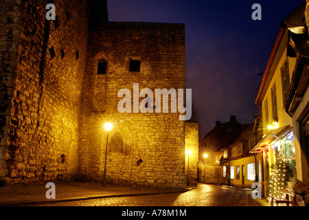 Sta. Katearinagatan (Saint Katarina) Road lit up by night Walled medieval Hanseatic Town Island of Gotland  Baltic Sweden Stock Photo