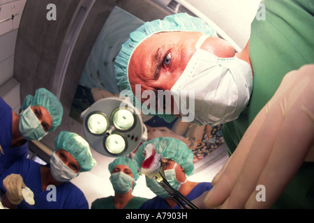 A photograph showing the patient's view of a surgical team. Stock Photo