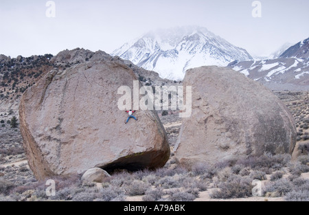 A man climbing on the Peabody Boulders in the Buttermilks near Bishop California Stock Photo