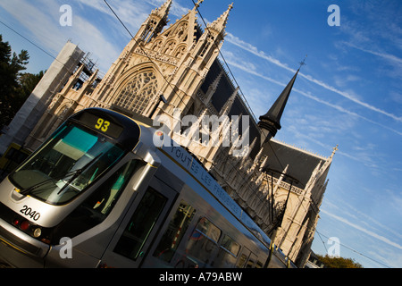 A Tram passing Notre Dame du Sablon Brussels Belgium Stock Photo