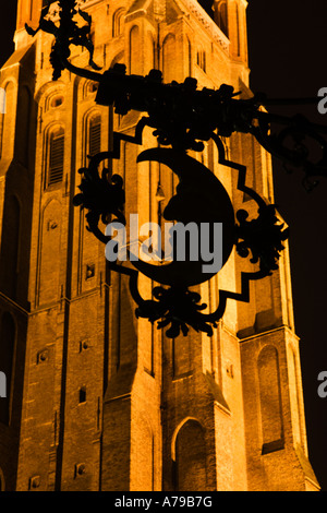 Sign at the Gruuthuse Museum with the Church of Our Lady behind Bruges Belgium Stock Photo
