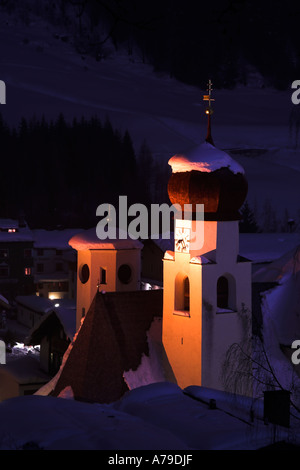 A night shot of St. Anton church in winter, St. Anton am Arlberg, Tirol, Austria Stock Photo