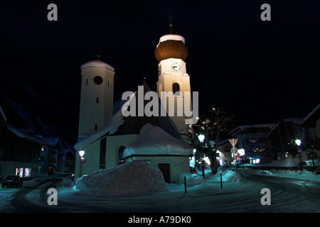 A night shot of St. Anton church, winter, St. Anton am Arlberg, Tirol, Austria Stock Photo