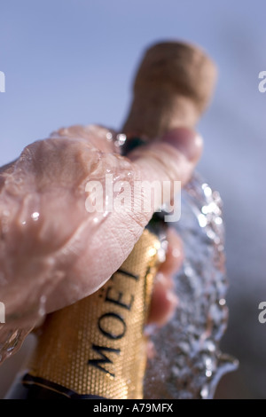 Bottle of champagne being opened in celebration Moet and Chandon Stock Photo