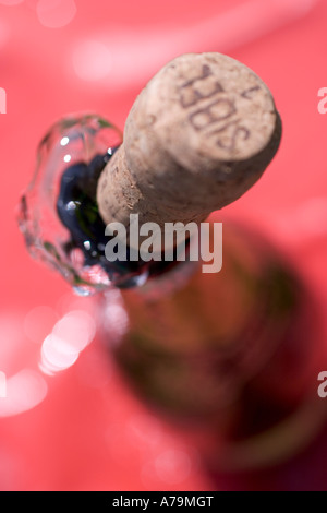 Bottle of champagne being opened in celebration taittinger Stock Photo