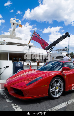 Puerto Banús, with luxury cars parked in port, Yachts behind