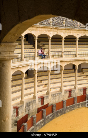 dh Bullring arena gallery RONDA SPAIN Tourist spectators sitting inside bullfighting british holiday makers tourists Stock Photo