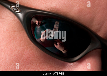 Poker game reflected in sunglasses Stock Photo