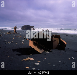 Ship Wreck on black sand beach, Stokksnes Icealnd Stock Photo