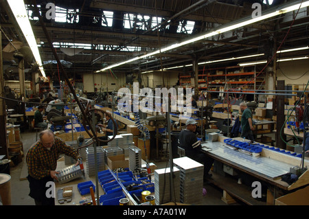 Workers at GAL Elevator Company in the NYC borough of the Bronx Stock Photo