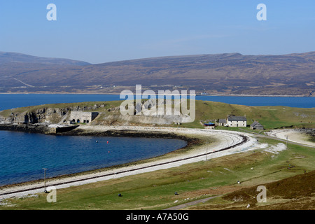 Old disused lime stone quarry on promontory  in Loch Eriboll Sutherland Stock Photo