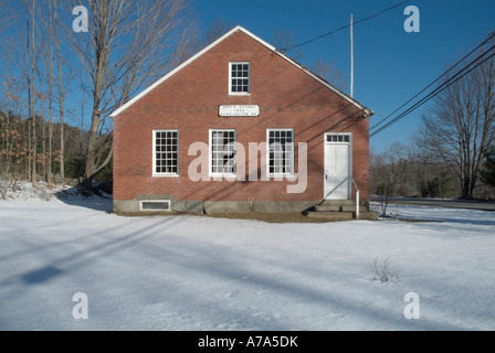 Brick schoolhouse in the historical district of Kensington, New Hampshire USA which is part of New England Stock Photo