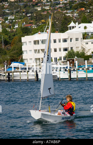 A young boy sailing a Sabot dinghy Stock Photo - Alamy