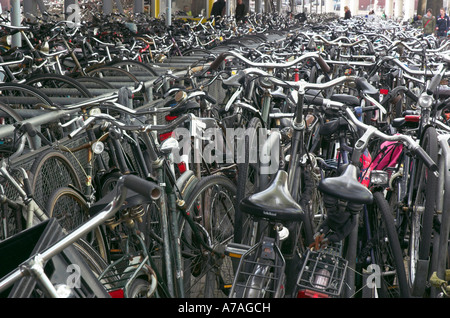 Hundreds of bikes parked in a multi storey bike park by the central station in Amsterdam Stock Photo