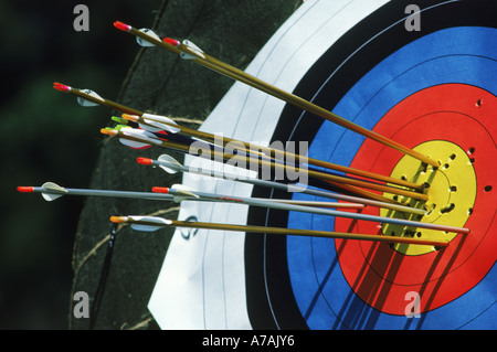 Arrows in or near the bulls eye of target during Olympic archery competition Stock Photo