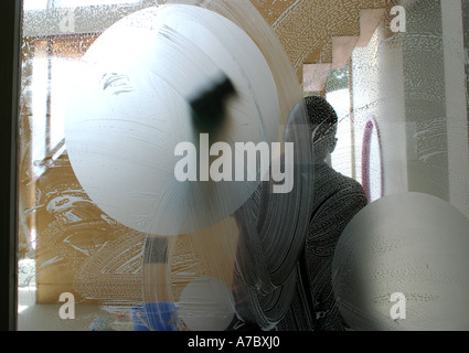 Washing the nursery doors Stock Photo