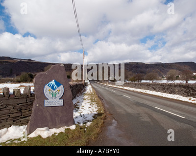 Snowdonia National Park boundary stone with bilingual logo in English and Welsh. Nantlle Gwynedd North Wales UK Stock Photo