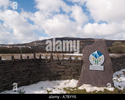 Snowdonia National Park boundary stone with bilingual logo in English and Welsh.  Nantlle Gwynedd North Wales UK Stock Photo