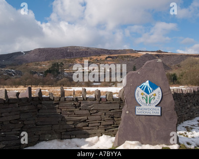 Snowdonia 'National Park' boundary stone with bilingual logo in English and Welsh.  Nantlle Gwynedd North Wales UK Stock Photo