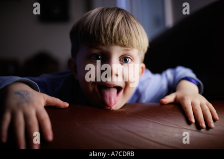 Small boy acting funny