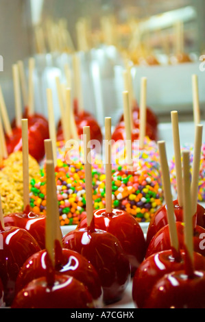 Candy apples in a display with sugar coating and sprinkles Stock Photo