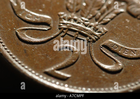 Detail of british two penny coin 2 pence with writing ICH DIEN money currency Stock Photo