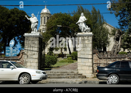 The pillars of the gateway to St John's Cathedral surmounted by statues of St John the Baptist and St. John the Divine, Antigua Stock Photo
