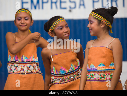 Head & shoulders portrait of three attractive local young girl folk dancers during a break in their show at Corinto Nicaragua Stock Photo