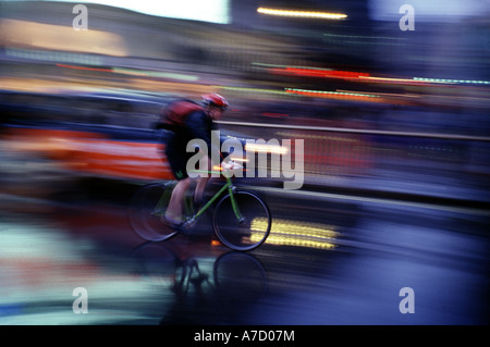 Picadilly Circus, Cyclist In The Rain, Blurred Stock Photo