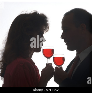 couple making a toast with red wine Stock Photo