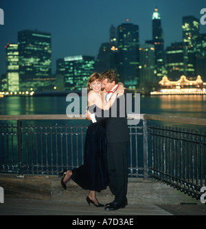couple dancing on pier in New York City Stock Photo