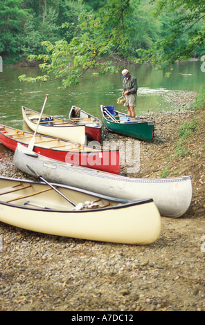 Canoes on the shore of Middle Fork of the Vermilion river a designated national scenic river Kickakpoo State Park Illinois Stock Photo