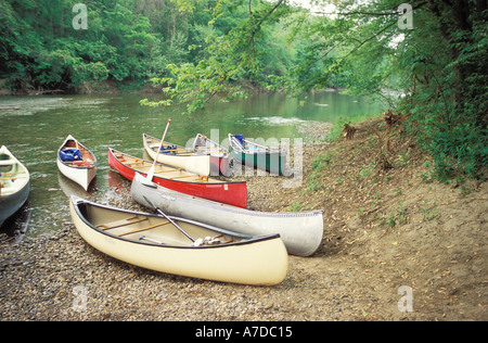 Canoes on the shore of Middle Fork of the Vermilion river a designated national scenic river Kickapoo State park Illinois Stock Photo