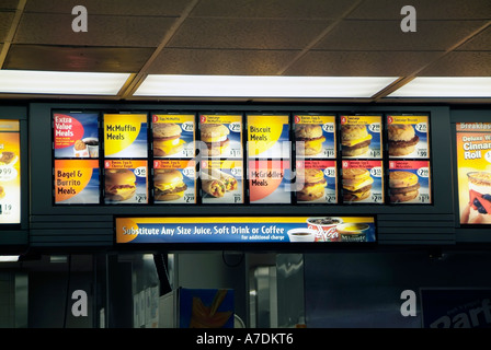 patrons at mcdonald s fast food restaurant stand in line to place an order for food stock photo alamy