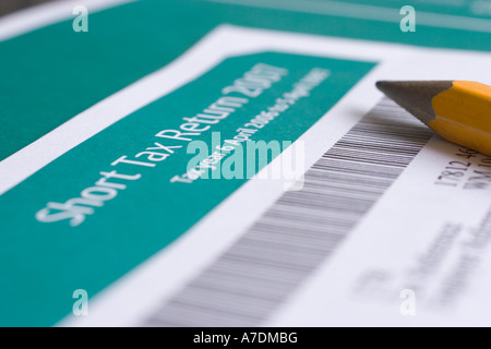 Pencil next to UK Short Tax Return HMRC Her majestys revenue and ...