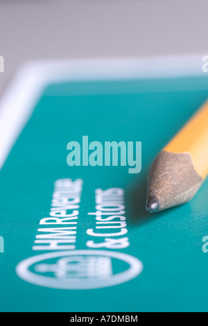 Pencil next to UK Short Tax Return HMRC Her majestys revenue and ...