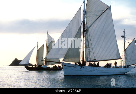 The French navy owned gaff yawl Mutin and the British gaff schooner Hoshi under sail  Stock Photo