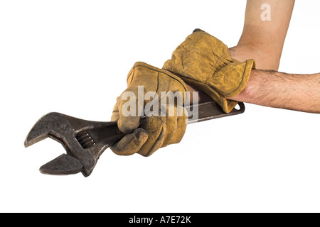 Man holding wrench with leather gloves Stock Photo