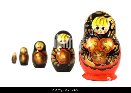 Five Russian dolls in sequence isolated on white. Stock Photo