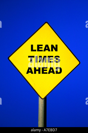 Road Sign with Lean Times Ahead written on it Metaphor for financial problems ahead Stock Photo