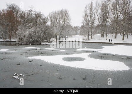 Snowy Pond, Abington Park, Northampton, Northamptonshire, England, UK Stock Photo