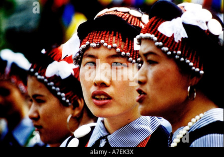 Lisu women wearing traditional clothing at a festival dancing Stock Photo