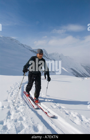 Skinning up the Asulkan Glacier, near Rogers Pass, Selkirk Mountains, Canadian Rockies, British Columbia, Canada Stock Photo